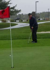 My friend Dug and I playing golf in a hurricane!